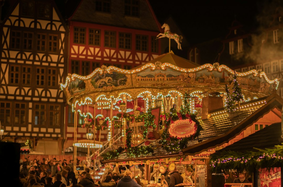 Christmas market carousel and timber-framed houses in Germany