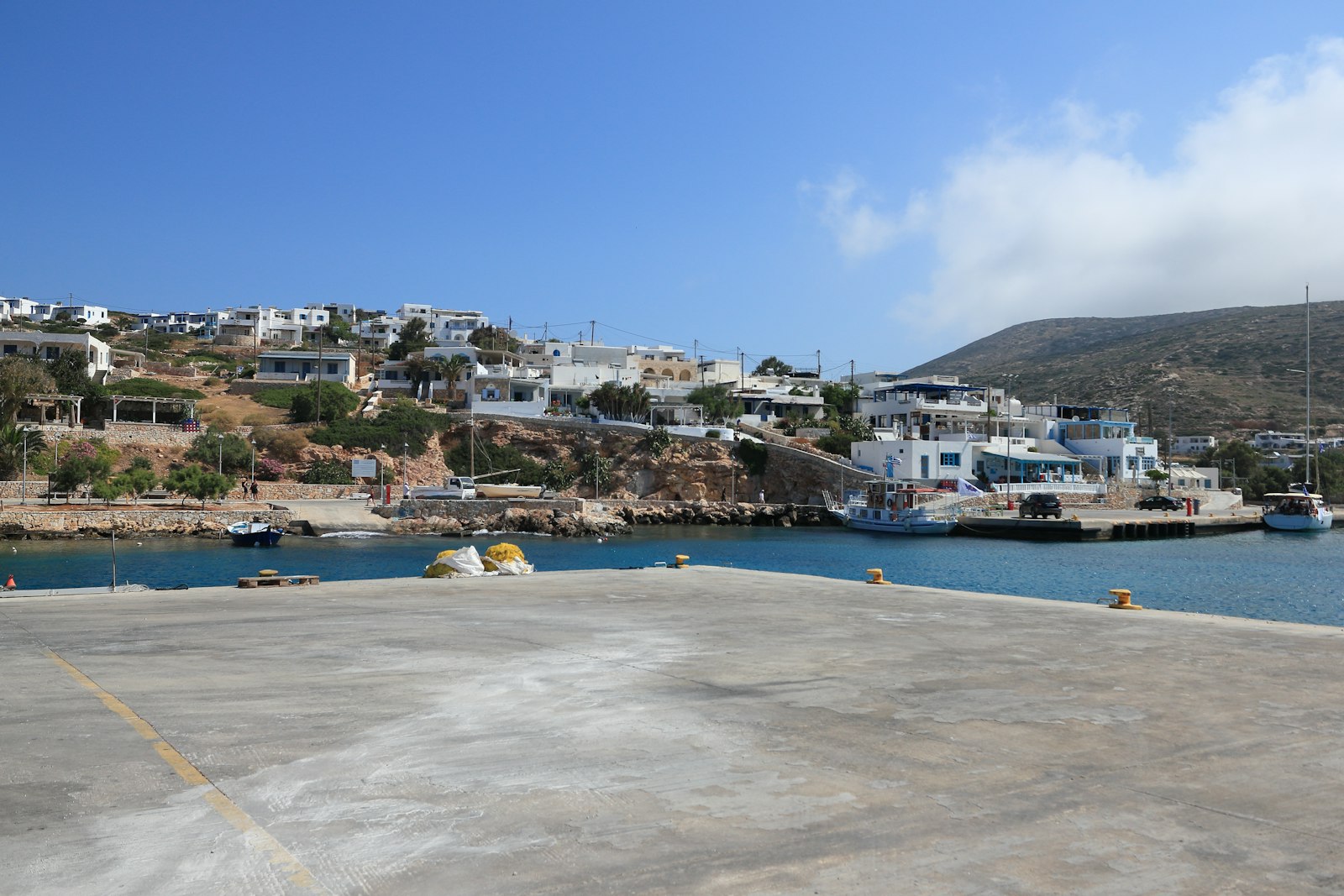 Island harbour town where ferries arrive on a multi-centre Greek holiday